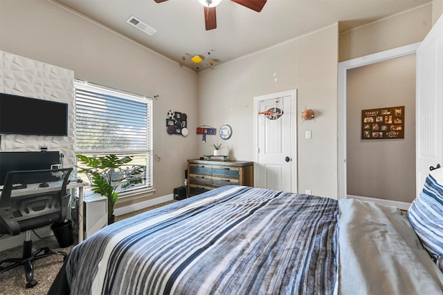 bedroom featuring ceiling fan and crown molding