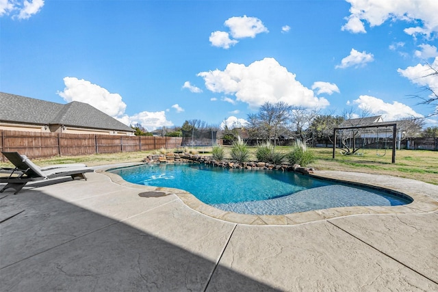 view of swimming pool featuring a patio area