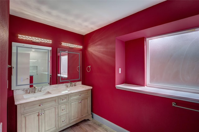 bathroom featuring vanity and hardwood / wood-style floors