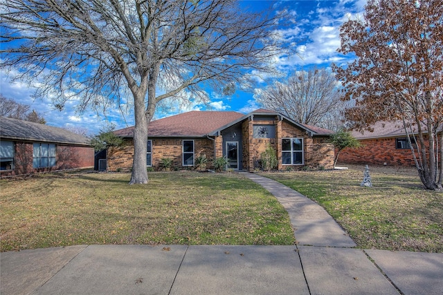 ranch-style house with a front yard