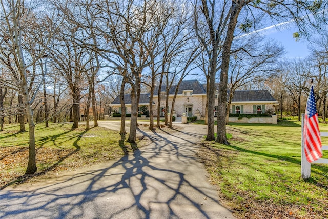 view of front of home with a front yard