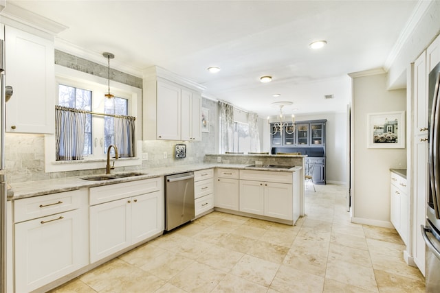 kitchen featuring white cabinets, pendant lighting, stainless steel dishwasher, and sink