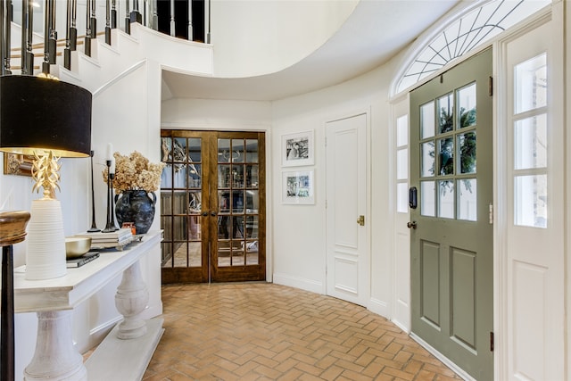 foyer entrance featuring french doors