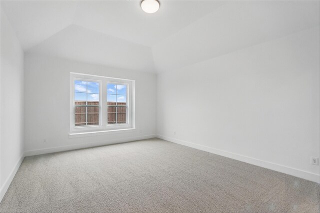 1829 Dolce Ln, Mclendon Chisholm, TX 75032 - carpeted empty room with baseboards and vaulted ceiling