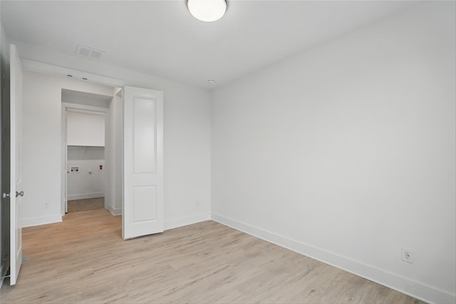 1829 Dolce Ln, Mclendon Chisholm, TX 75032 - unfurnished bedroom featuring visible vents, light wood-style flooring, and baseboards