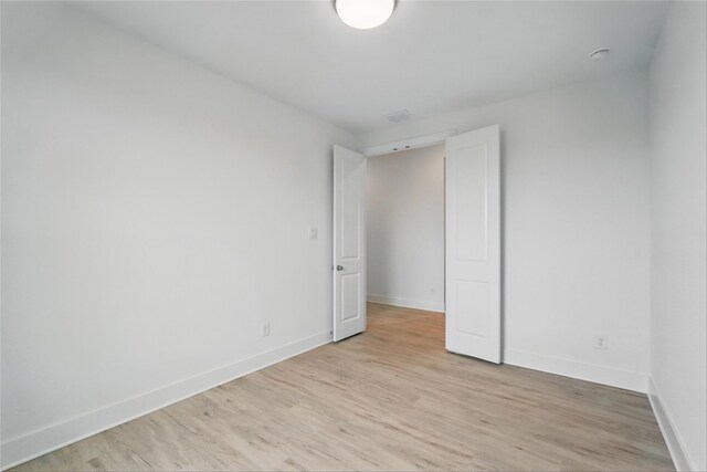 1829 Dolce Ln, Mclendon Chisholm, TX 75032 - spare room featuring baseboards and light wood-style floors