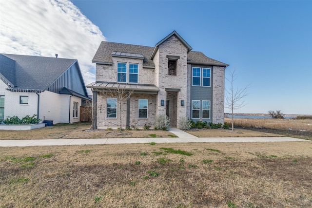 view of front of property with a front lawn