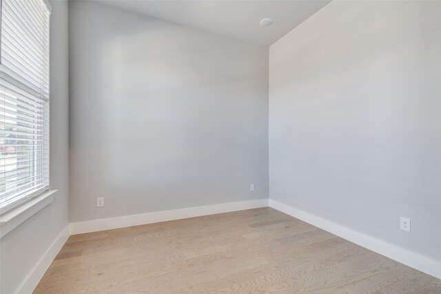 unfurnished room featuring light hardwood / wood-style flooring