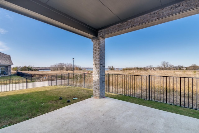 view of patio / terrace with a rural view