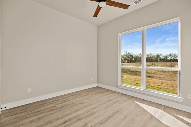 unfurnished room featuring ceiling fan and light hardwood / wood-style floors