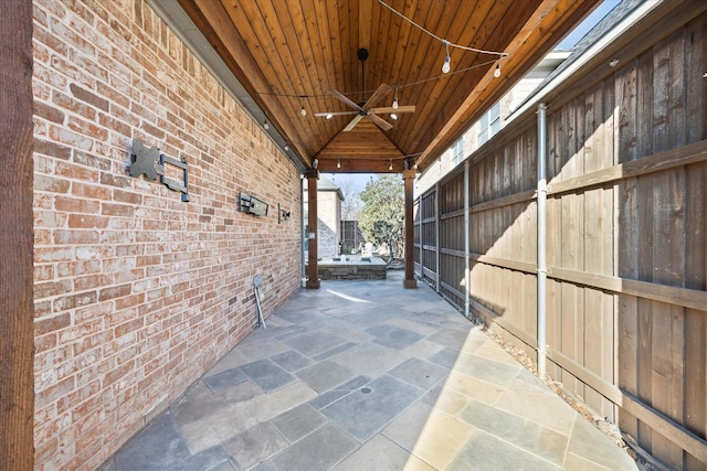 view of patio with ceiling fan