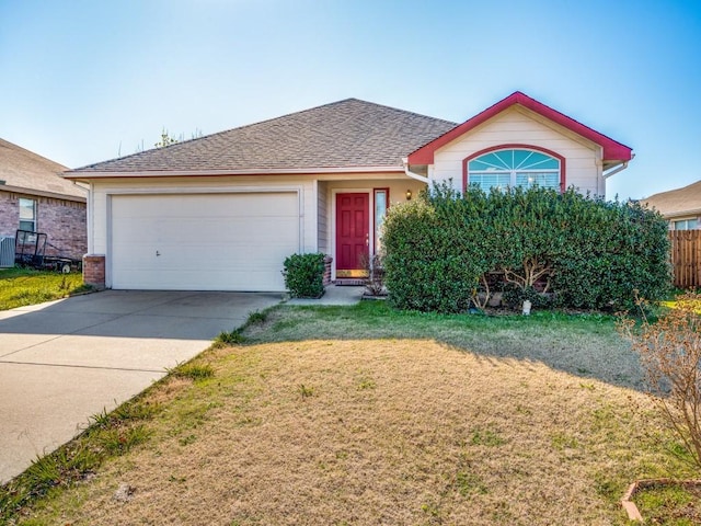 single story home featuring a front lawn