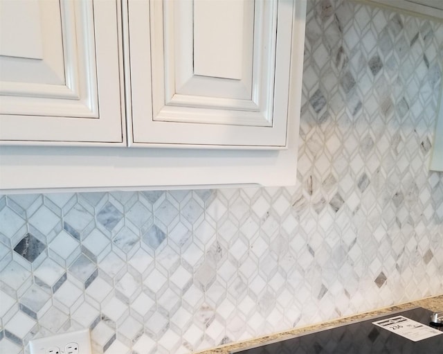 interior details featuring white cabinets