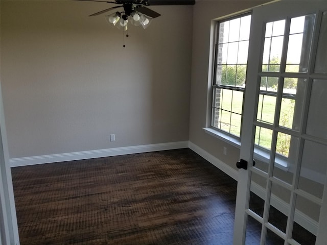 spare room featuring plenty of natural light and ceiling fan