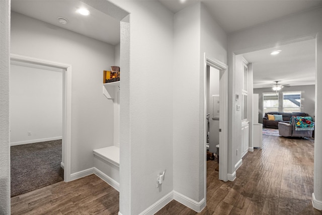 hall with dark hardwood / wood-style floors