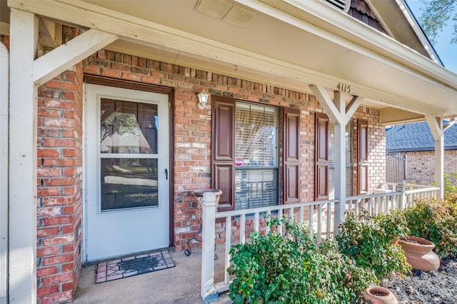 property entrance featuring a porch