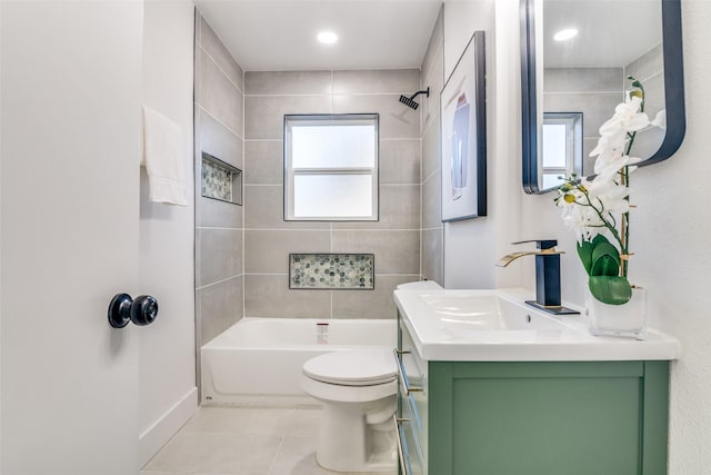 full bathroom featuring tile patterned floors, a wealth of natural light, vanity, and toilet