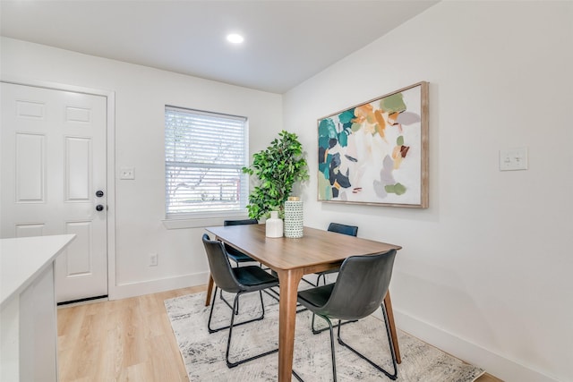 dining room featuring light hardwood / wood-style floors