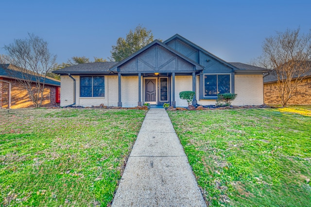 view of front of home with a front lawn