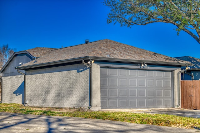 view of property exterior with a garage