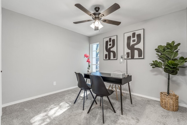 home office featuring ceiling fan and carpet