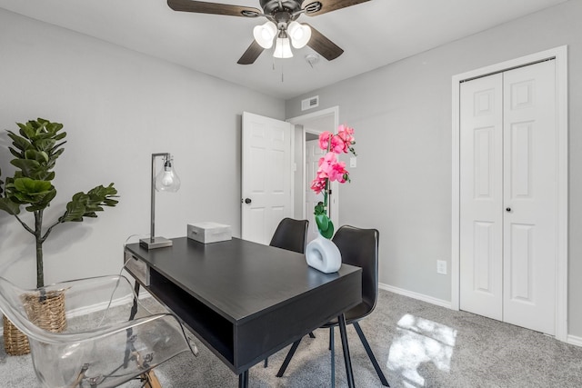 home office with carpet and ceiling fan