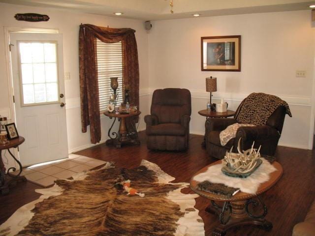 sitting room with hardwood / wood-style floors