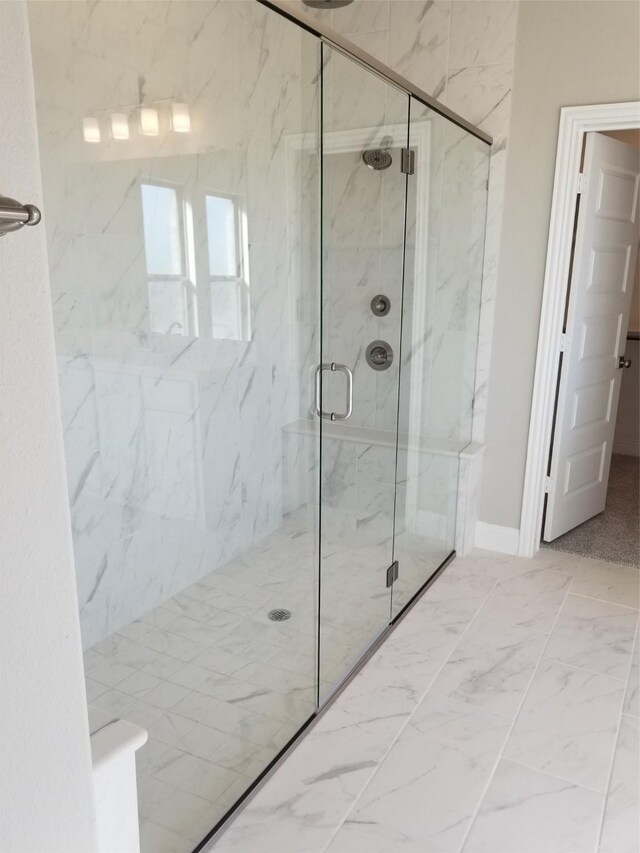 bathroom featuring walk in shower