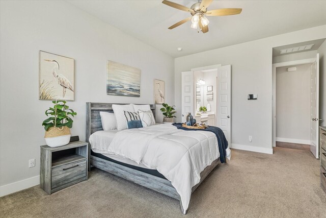 carpeted bedroom with ceiling fan