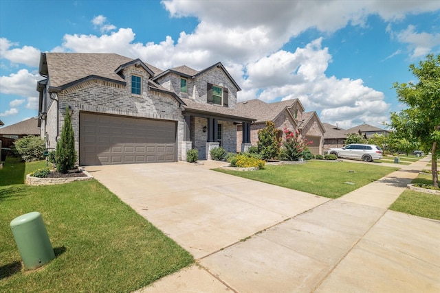 view of front facade featuring a garage and a front yard