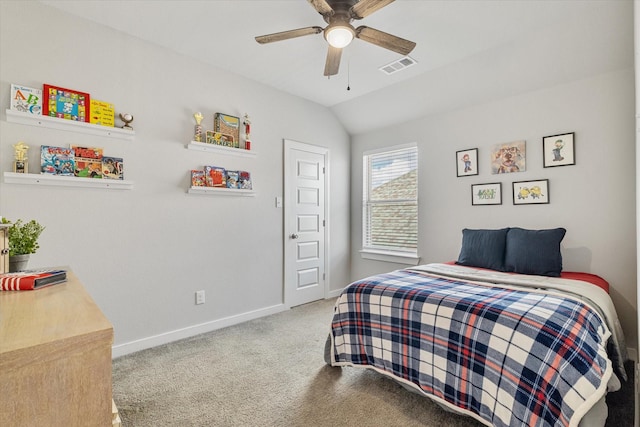 carpeted bedroom with visible vents, lofted ceiling, baseboards, and ceiling fan