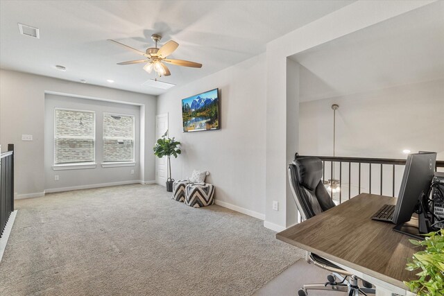 office area with light colored carpet and ceiling fan