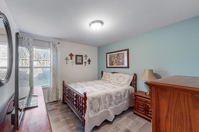 bedroom with a textured ceiling