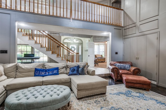 living room with a high ceiling