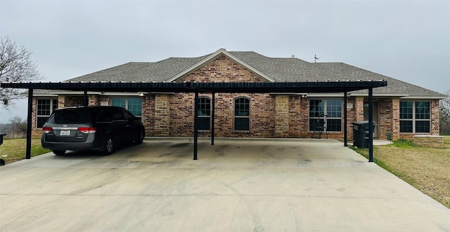 view of front facade with a carport