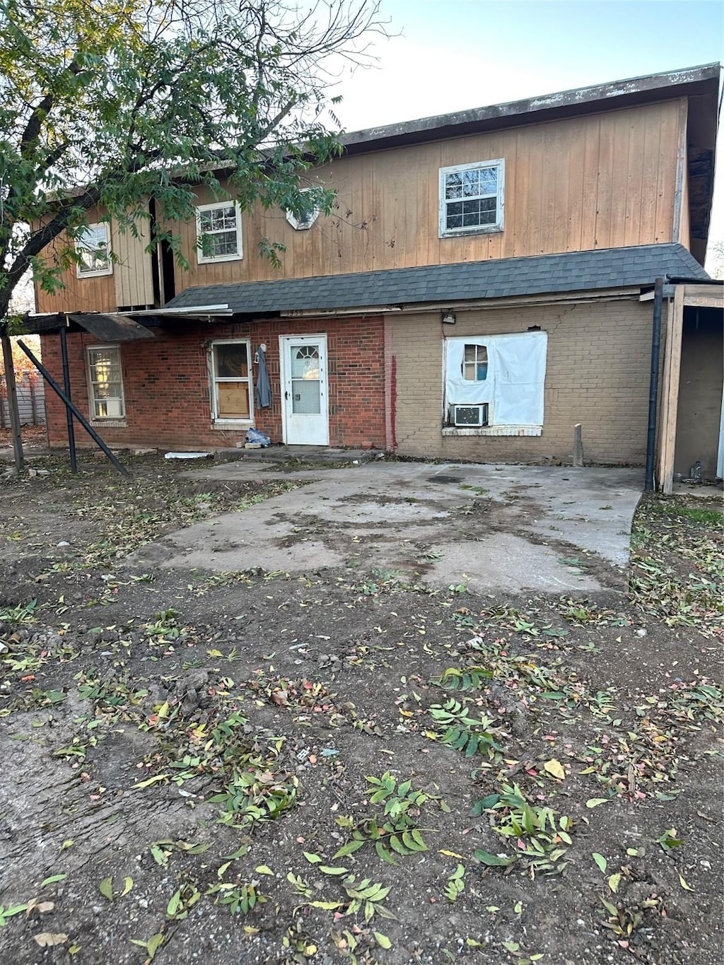 rear view of property with a patio