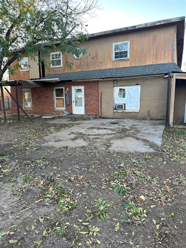 rear view of property with a patio