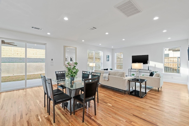 dining room with light wood-type flooring