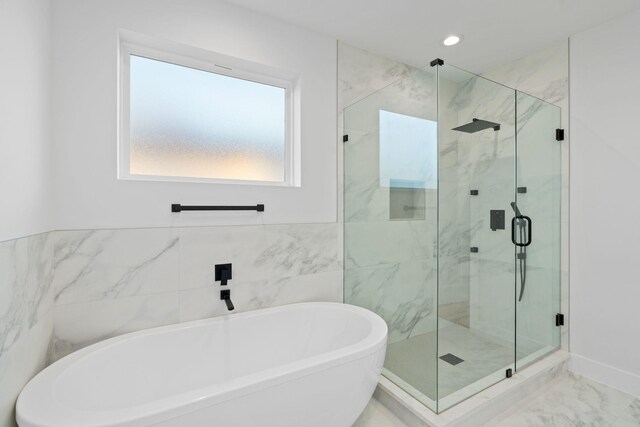 bathroom with independent shower and bath