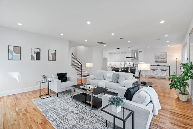 living room with light hardwood / wood-style floors