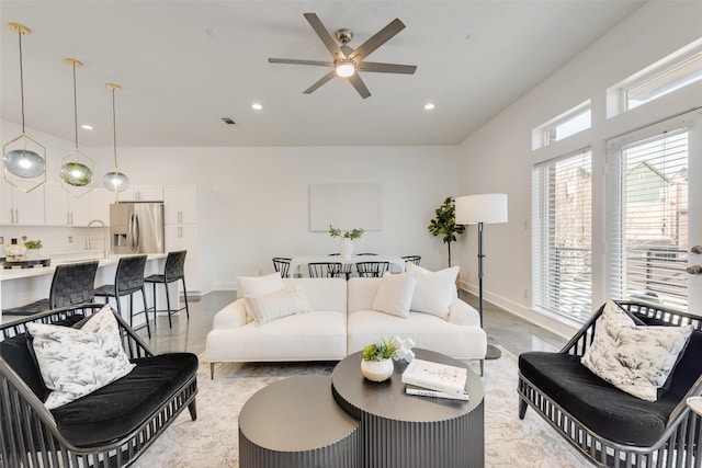 living room with ceiling fan