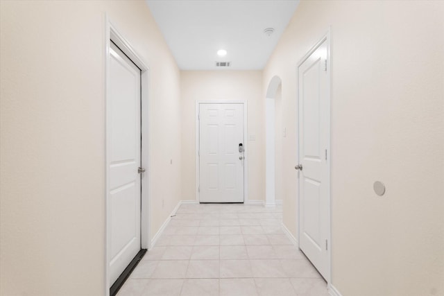 hallway with light tile patterned flooring