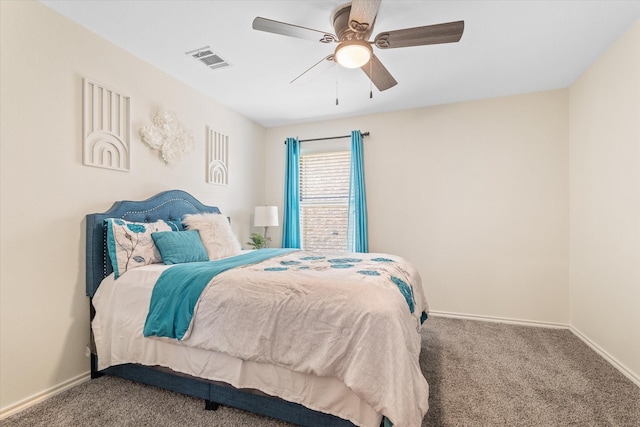 bedroom with ceiling fan and carpet floors