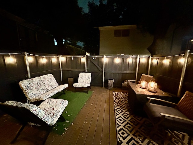 view of deck at night