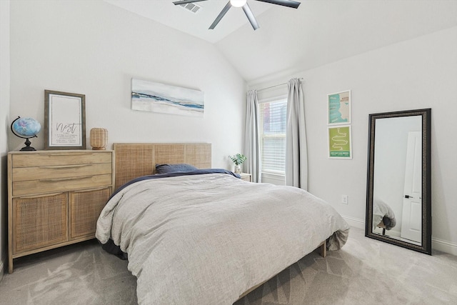 carpeted bedroom with ceiling fan and lofted ceiling