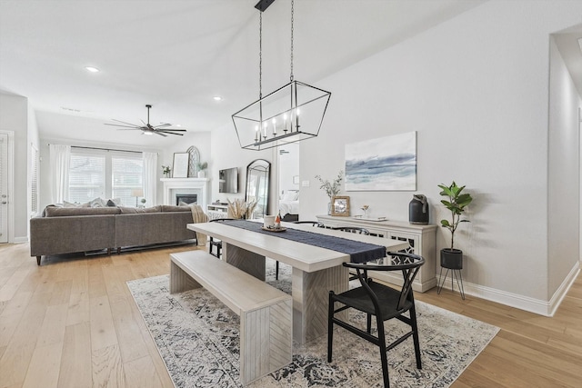 dining room featuring ceiling fan and light wood-type flooring