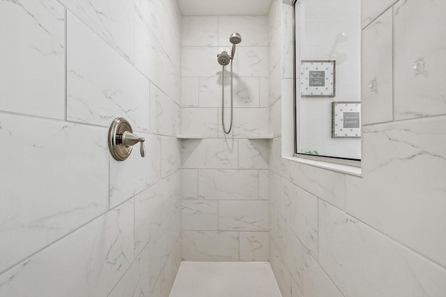 details with a tile shower