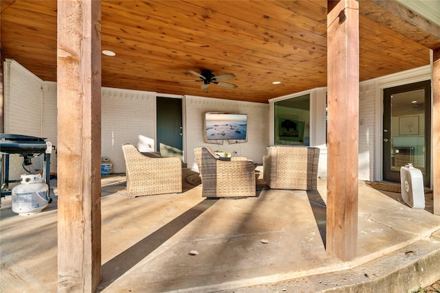 view of patio featuring an outdoor hangout area and ceiling fan