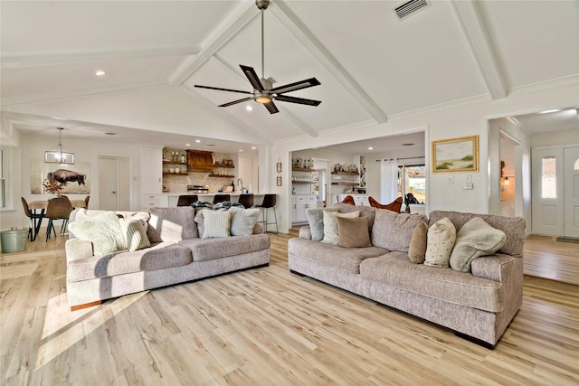 living room featuring high vaulted ceiling, beam ceiling, light hardwood / wood-style floors, and a wealth of natural light