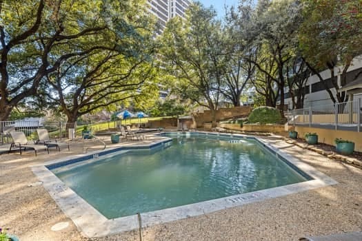 view of swimming pool with a patio area